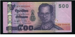 500 Bath.

Holographic foil strip at left.

King Rama IX on face; statue and palace on back.

Pick #107 Banknote