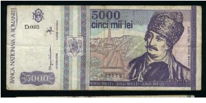 5000 Lei.

Square-topped shield at left (May 1993).

Avram Iancu and church on face; church, the gate of Alba Iulia stronghold and gray seal on back.

Pick #104 Banknote