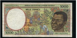 1000 Francs.

Serial -N- prefix (Equatorial Guinea).

Young man at right, harvesting coffee beans at center on face; forest harvesting, Okoume raft and Bakele wood mask on back.

Pick #502N-g Banknote