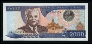 2000 Kip.

Kaysone Phomvihane at left, arms at upper right, temple in underprinting on face; hydroelectric complex at center on back.

Pick #33a Banknote