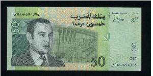 50 Dirhams.

King's Hassan II son at left, big dam in background at center on face; stylized fortress at center on back.

Pick #new Banknote