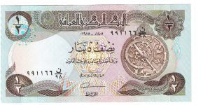 1/2 Dinar from Iraq  Set#2 i think Dated around 2003/2004

*Nice serial Number* Banknote