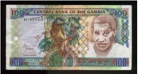 100 Dalasis.

Parrot at center, man at right on face; Arch 22 monument in Banjul on back.

Pick #24 Banknote