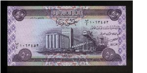 50 Dinars.

Grain silo at Basarah on face; date palms on back.

Pick #90 Banknote