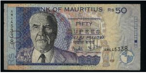 50 Rupees.

J. M. Paturau at left, arms at lower left, building facades at center and standing Justice with scales at lower right in underprinting on face; building complex at center right on back.

Pick #50 Banknote