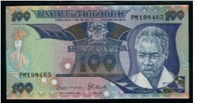 100 Shilingi.

Portrait of an older President J. Nyerere at right, torch at left, arms at center on face; graduation procession on back.

Pick #14b Banknote