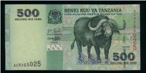 500 Shilingi.

Water buffalo at center right on face; hospital at center, boats in background on back.

Pick #35 Banknote