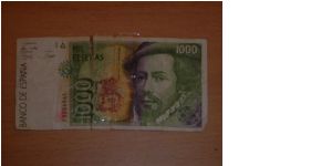 1000 pesetas, held together with tape Banknote