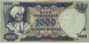 1000 RUPIAH. SIGNED BY DRS.RACHMAT SALEH,SOEKSMONO B.MARTOKOESOEMO. (O)PANGERAN DIPONEGORO (R)A FARMER PLOUGHING IN THE RICEFIELD. WATERMARK MAJAPAHIT STATUE. 158X79MM Banknote