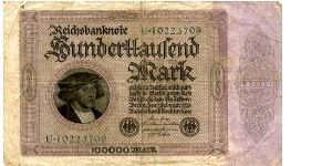 Berlin 1 Feb 1923 
100000M Pink/Black 
Seal Black
Front Mans head, Value above seals
Rev Value in fancy cachet
Watermark Yes Banknote