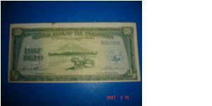 1/2 (Half) Peso
Obverse:  Mayon Volcano
Reverse: Value
Size:  130mm x 60mm Banknote