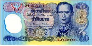 Polymer 
50b 1996 
Multi
50th anniversary of HM Bhumibol's accession to the Throne
Finance Minister A Viravan 
Governor R Marakanond
Front Coat of arms, Fancy seal, King Rama IX, Value above and in see through window
Rev  Rama VII on the throne. In 1932, during His reign, a coup d'état was staged, resulting in transferral of power to a Legislative Assembly—the 150-year absolute rule of the Chakri Kings ended and the Constitutional Monarchy of the present day was born. The Royal Palace at Banknote