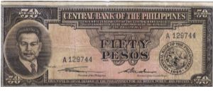 PI-138a Super RARE English Series 50 Pesos note with Quirino / Cuaderno signatures. Banknote