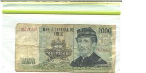 Deep blue-green, dark olive-brown on multicolour underprint. Ignacio pinto at right and as watermark, military arms at center. Monument to Chilean heroes on back. 12 signature varieties. Banknote