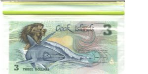 Deep green, blue and black on multicolour underprint. Fishing canoe and statue of the god of Te-Rongo on back. Banknote