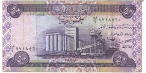 Purple on multicolour underprint. Grain silo at Basrah. Date palms on back. Banknote