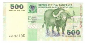 500 Shilingi

Front:
Cape buffalo

Back:
Nkrumah Hall at the University
of Dar es Salaam, sailing boats, snake


Watermark:
Head of a giraffe Banknote