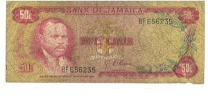 Red on multicolour underprint. Marcus Garvey at left, arms in underprint at center. National shrine at right on back. Banknote