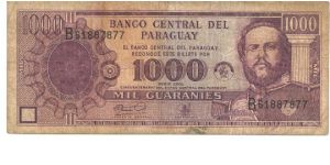 Like #201 207 213 214 but with anniversary text below date.

Purple on multicolour underprint. Mariscal Francisco Solano Loez at right. National shrire on back. Two signature varieties.

Black serial # upper left and lower right.

Printer: F-CO. Banknote