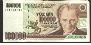 Reddidh brown, dark brown and dark green on multicolour underprint. Equestrian statue of Ataturk at lower lect center. Children presenting flowers to Ataturk at left center on back. Banknote