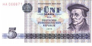 East Germany

Purple on  multicolour underprint. Thomas Muntzer at right. Harvesting on back. Banknote