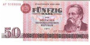 East Germany

Dark red on multicolour underprint. Friedrich Engels at right. Oil refinery on back. Banknote