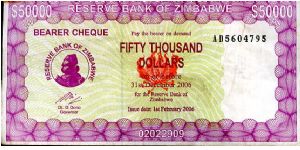 $50000
Purple/Green/red
Bearer Cheque
Governor Dr G Gono
Front Matapos rocks & Value
Rev Waterfall
Security Thread
Watermark Zimbabwe Stone carved Bird Banknote