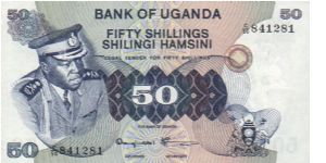 50 Shillings. Idi Amin on front; Hydroelectric dam on back Banknote