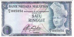 1 Ringgit w/Serial No:P/4 005054
The Revision C of first Series was issued in 1981

Obverse:The portrait of the first Seri Paduka Baginda Yang di-Pertuan Agong-King of Malaysia

Reverse:The traditional design of Kijang Emas, an official logo of Bank Negara Malaysia.

Signed By: Gabenur of Bank Negara Malaysia, Tan Sri Dato' Abdul Aziz bin Haji Taha

Size:
120.5 x 64.0mm Banknote