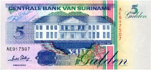 5 Gulden
Blue/Green
Log trucks above Value & Central Bank building 
Loging & Toucan
Wmk :toucan Banknote