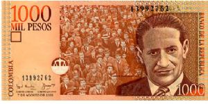 1000 pesos 
Orange/Black
7.8.2001
Jorge Eliécer Gaitán & crowd 
Jorge Eliécer Gaitán addressing the crowd 
Security thread
Wtrmrk JE Gaitán Banknote