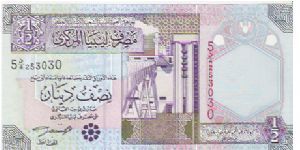 1/2 DINAR

54 253030

P # 63 Banknote