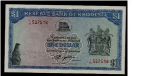 Reserve Bank of Rhodesia One Dollar, # L/95 527518 in Aunc condition; one barely noticeable vertical/center fold, crisp and clean condition with beautiful artwork and printing. P-30b Banknote