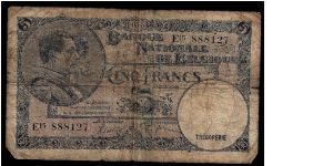 Banque National de Belgique (Belgium) 5 francs, dated 21/03/1938. P-97. # E15 888127. In extremely poor condition with a crucifix fold, spots, small tears and marks. 123mm x 74mm. Banknote