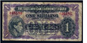 The (British) East African Currency Board 1 Shilling, dated 1st January 1943, # A/2 46180. P-27. In good condition, no rips or tears although well-worn. 120mm x 60mm. Banknote