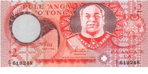 2 Pa'anga. King on front, village scene on back Banknote