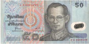 50 Baht. Polymer Note. Tarrin Nimmanahaeminda (Larger sig),and 
Chatu Mongol Sonakul.

This combination used May 1998 to May 2001

King Bhumiphol Adulyadja (Rama IX) in uniform of the supreme commander Thai armed forces
Monument ofKing Phra Chom Klao Chaoyuhua (Mongut) Rama IV seated at table with globe and telescope in background along with temple. Info thanks to De-Orc! Banknote