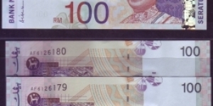 RUNNING PAIR RM100. PREFIX AF. SIGNED BY ALI ABUL HASSAN AT THE CORNER SIDE Banknote
