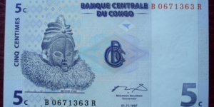 Banque Centrale du Congo |
5 Centimes |

Obverse: Suku mask |
Reverse: Zande harp |
Watermark: Head of an Okapi Banknote