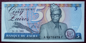 Banque du Zaïre |
5 Zaïres |

Obverse: The Zaïrean dictator Mobutu Sese Soku (1930-1997) and a Leopard |
Reverse: Building |
Watermark: Mobutu Sese Soku Banknote