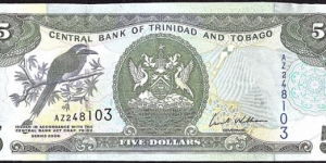 Trinidad & Tobago 2006 5 Dollars.

Cut unevenly along the top. Banknote