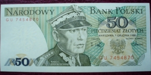 Narodowy Bank Polski |
50 Złotych |

Obverse: Karol Wacław Świerczewski and Coat of Arms |
Reverse: Order of Grunwald |
Watermark: Coat of Arms Banknote