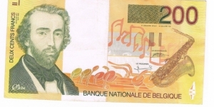 1995 BELGIUM 200 FRANCS
Black and brown on yellow and orange underprint. Adolphe Sax at left, saxophone at right. Signature (5 and 15). Back: Saxophone players outlined at left, church, houses in Dinant outlined at lower right. Watermark: Adolphe Sax. Banknote