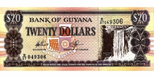 20 Dollars  
ND (1996). Brown and purple on multicolor underprint. Map of Guyana at right, bank arms at center. Ascending size serial number at upper right. Signature 10; 11; 12. Back: Shipbuilding at left, ferry Malali at right. Design element in colored border at left and rig Watermark: Macaw's (parrot) head.
 Banknote