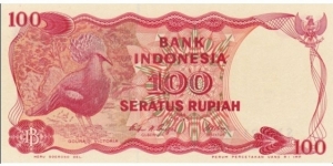 100 Rupiah  
1984. Red on multicolor underprint. Victoria crowned pigeon at left. Back: Asahan Dam. Watermark: Arms.
 Banknote