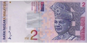 2 Ringgit  
ND (1996-99). Purple and red-violet on multicolor underprint. T. A. Rahman at right. Ascending size serial number. Back: Modern tower at left, communications satellite at upper center. Watermark: T. A. Rahman. Printer: NBM (without imprint).
 Banknote