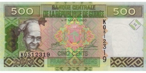 500 Francs. Woman at left, arms at center and traditional wooden sculpture at right on face; minehead at center on back. Banknote