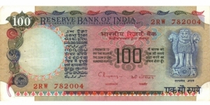 100 Rupee Note signed by C.RANGARAJAN. Watermark: Lion Capital. Dimensions: 157 × 73 mm. Main Color: Grey and Yellow. Obverse: Lion Capital, Ashoka Pillar. Reverse: Agricultural Progress and Dam. Banknote