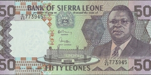 Sierra Leone 1989 50 Leones.

Cut unevenly.

A black ink spot at top left on the back. Banknote