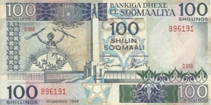 100 Shilin Dated 1989,Central Bank Of Somalia(O) Dagathur Monument(R)Factory. Banknote